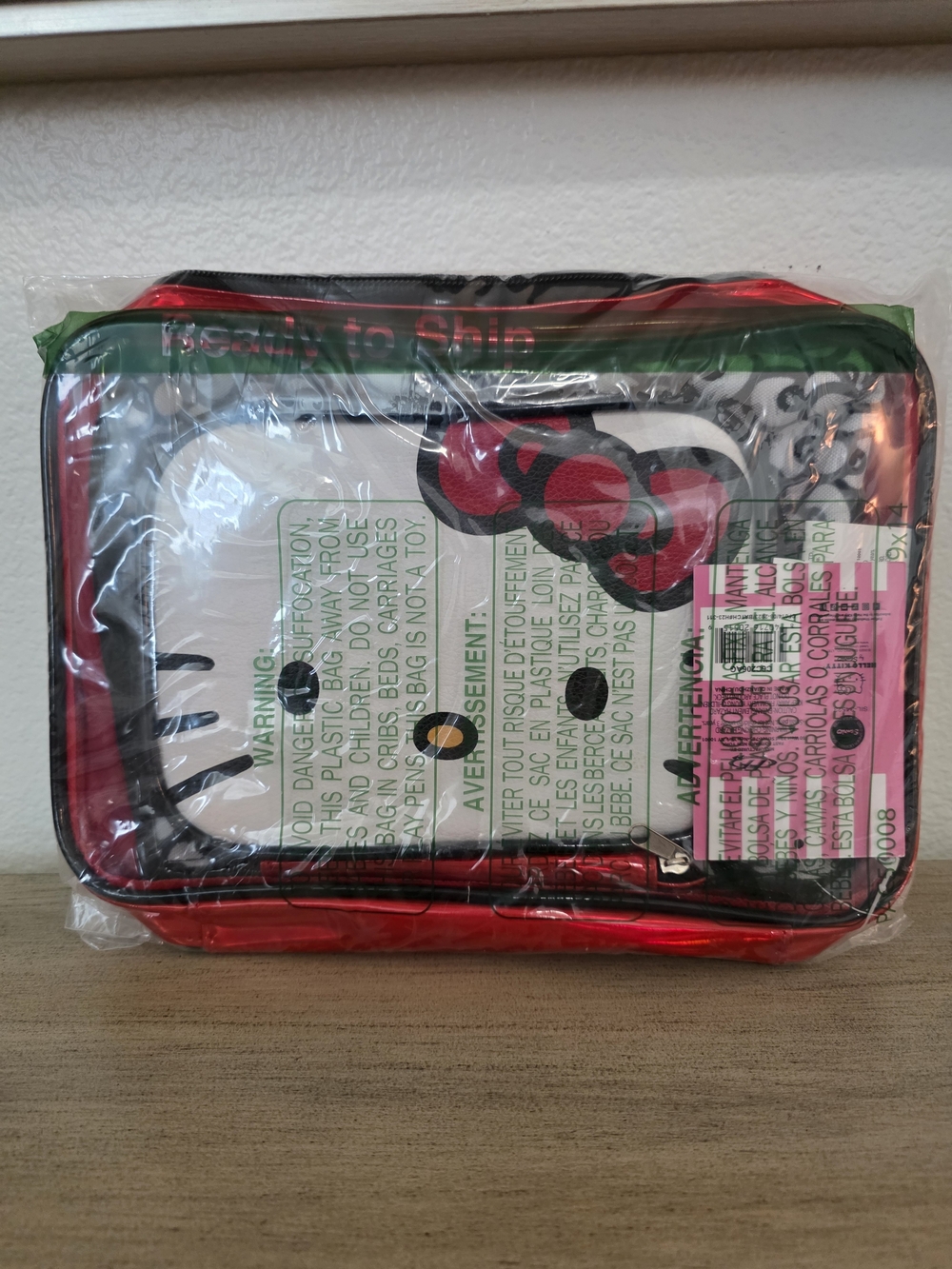 Two Hello Kitty Cosmetic Pouch with Red Trim and Bows the Other Solid HelloKitty